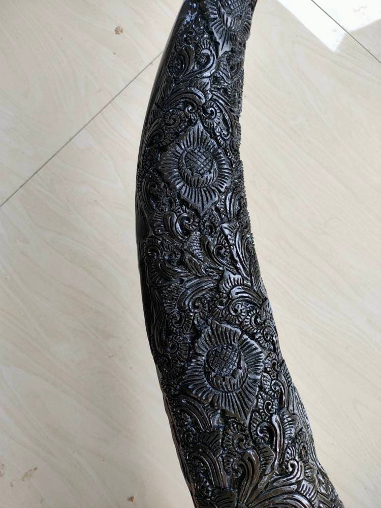 carve buffalo skull with long carved horn mandala