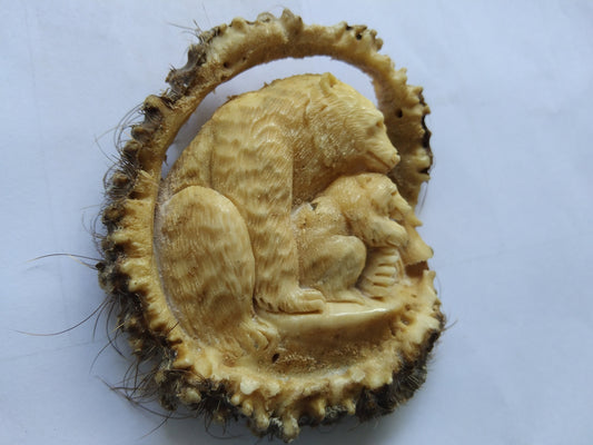 Antler carving mother bear and baby for pendant