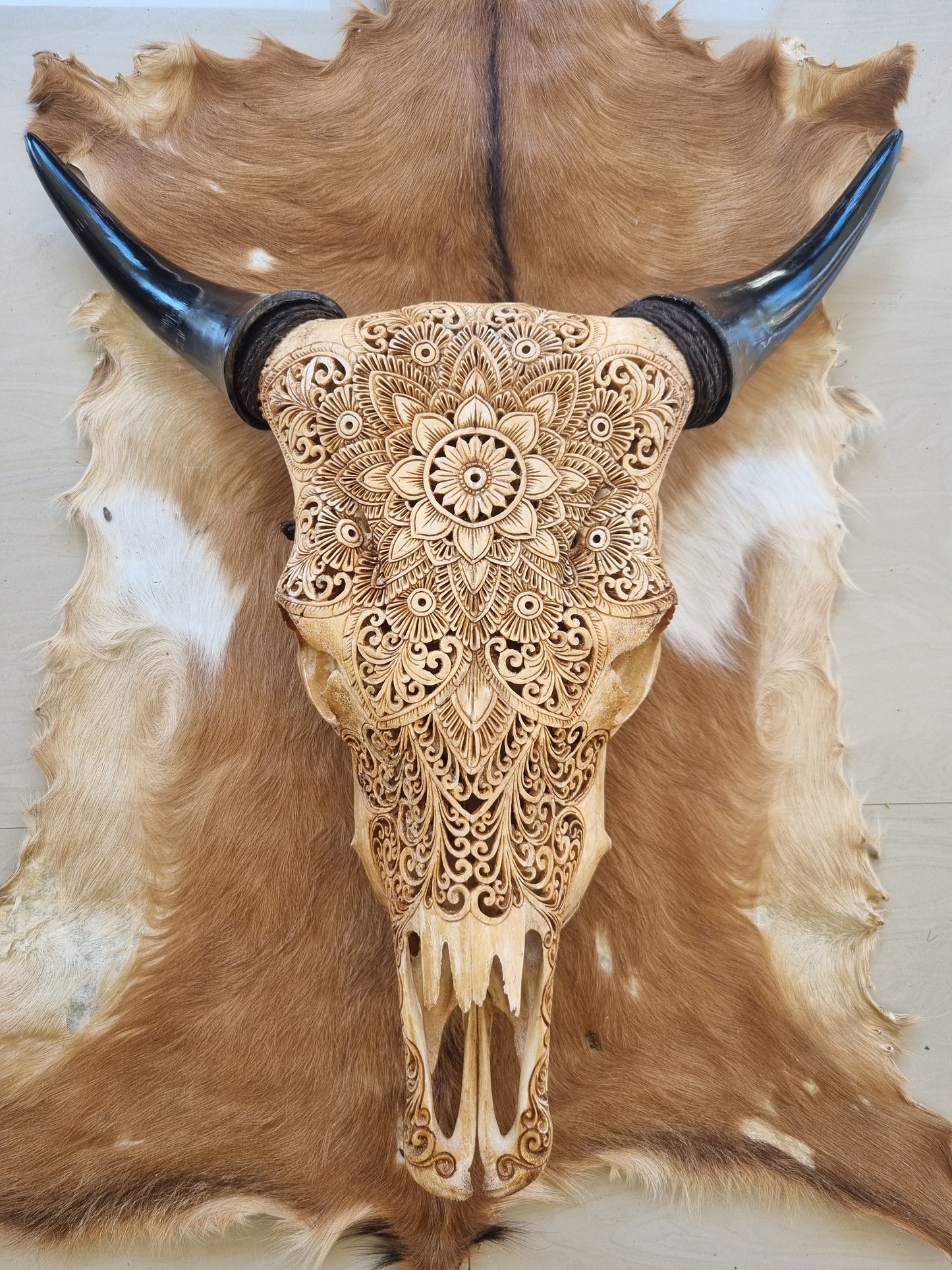 carve cow skull mandala