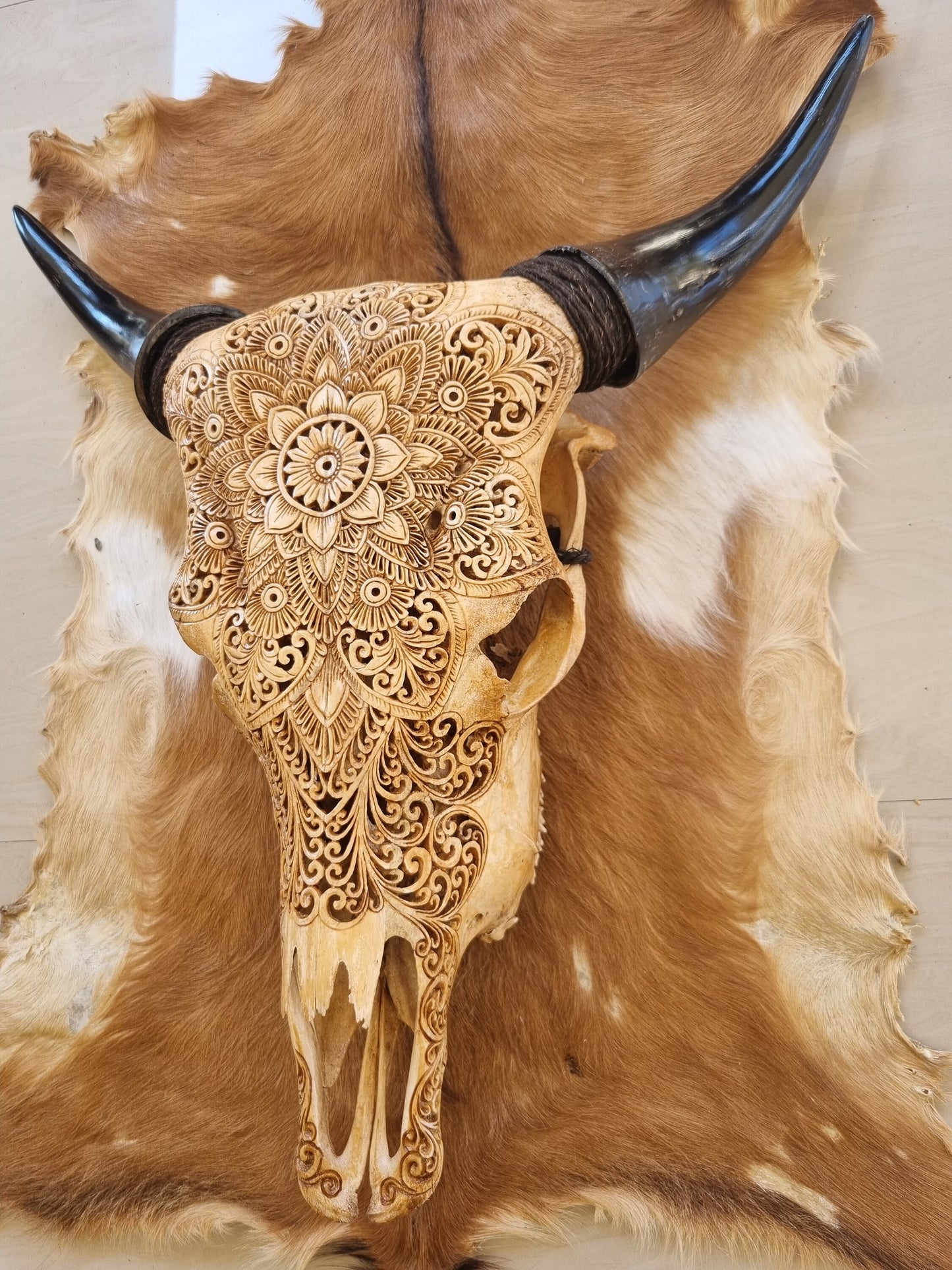 carve cow skull mandala