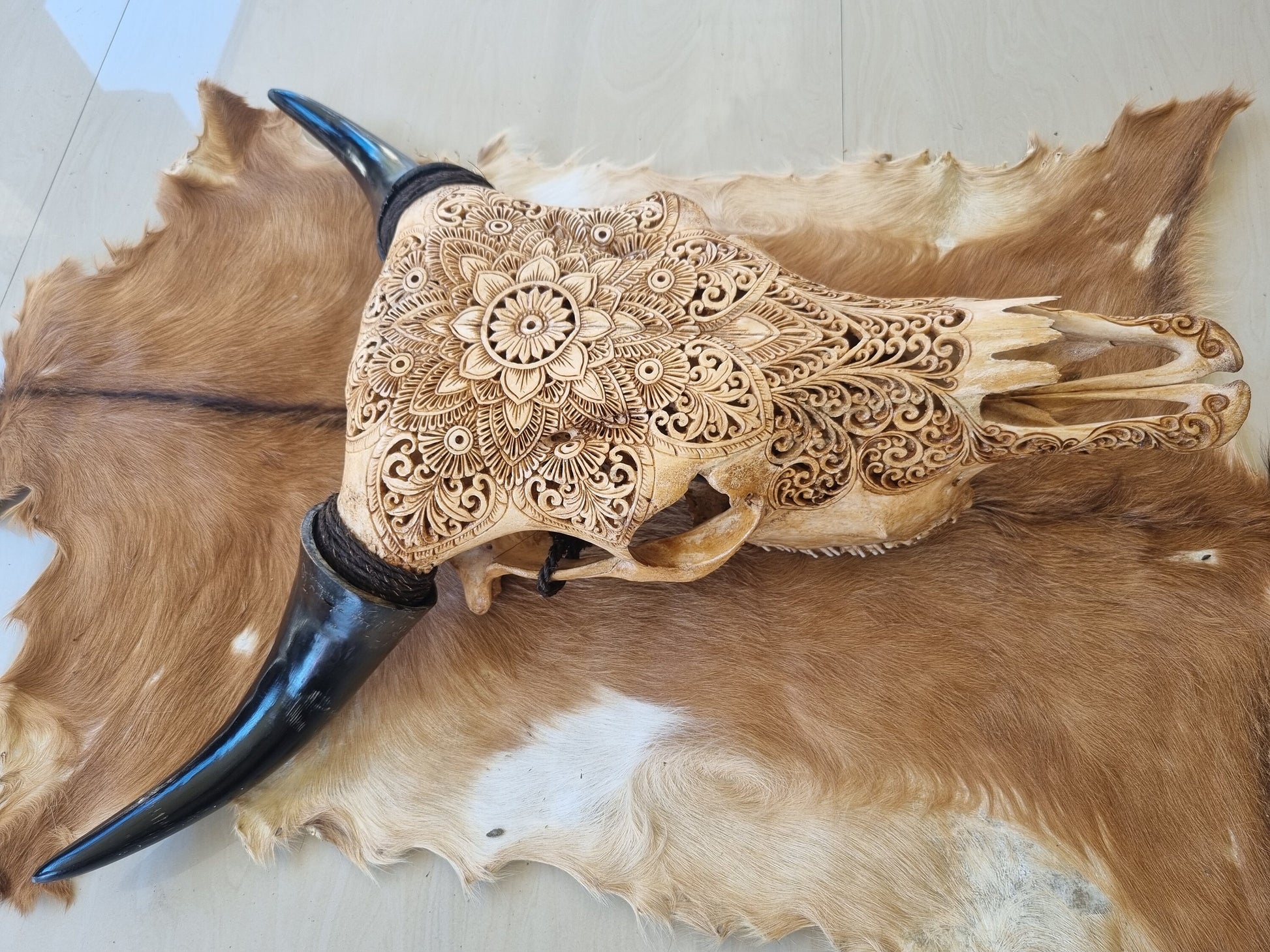 carve cow skull mandala