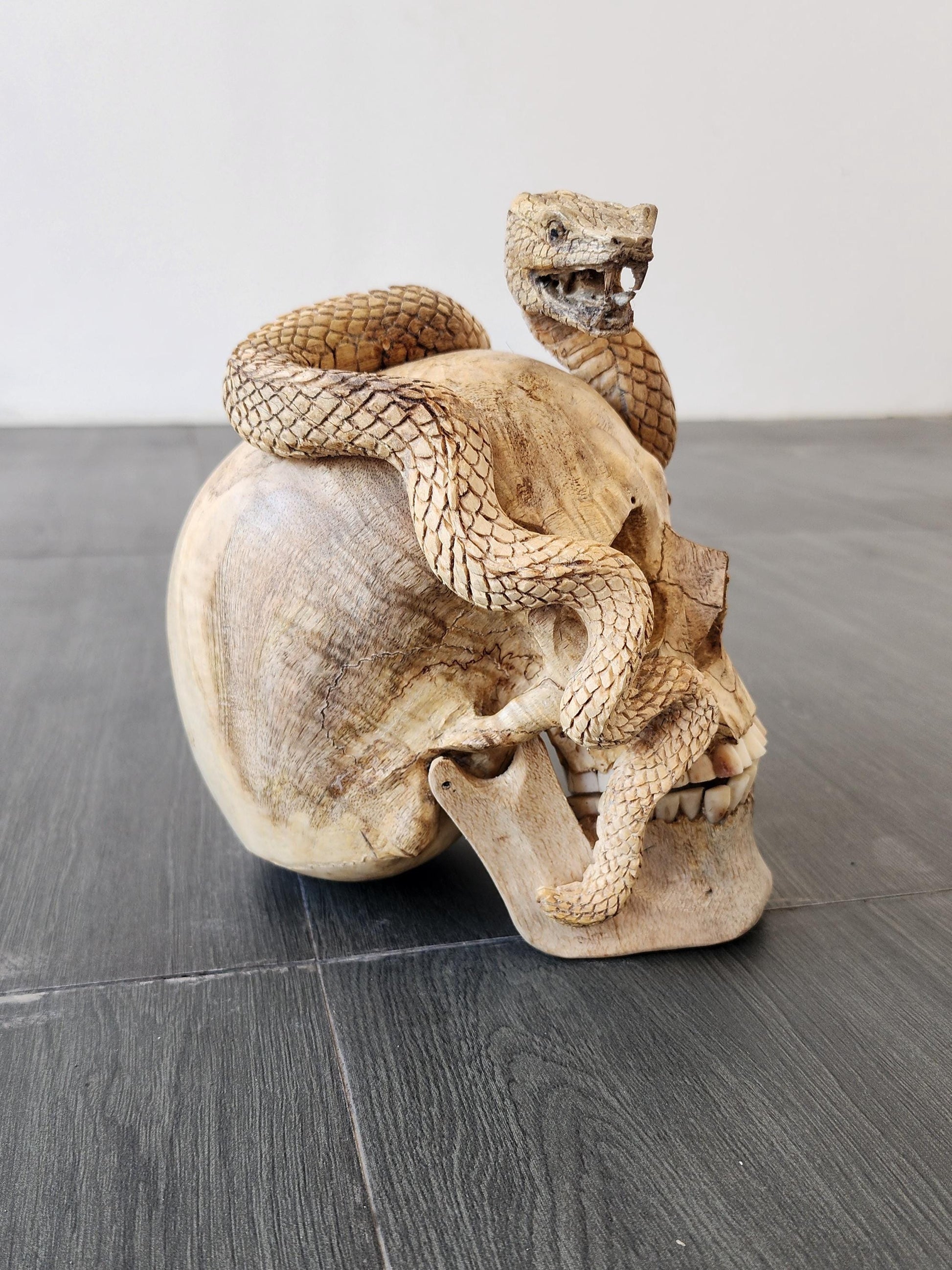 human skull art carving Skull snake wood